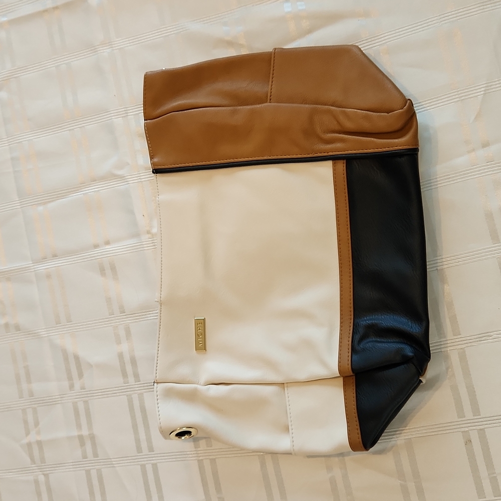 cream tan and black shell